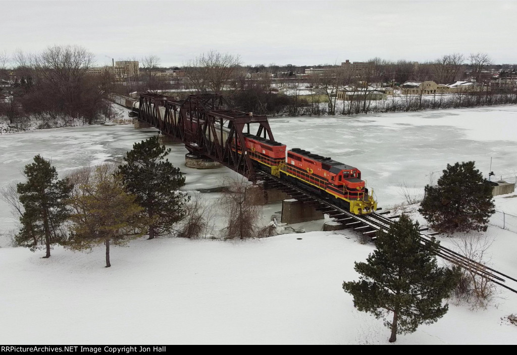 Crossing the old swing bridge, 3414 & 3484 head for Durand with 702